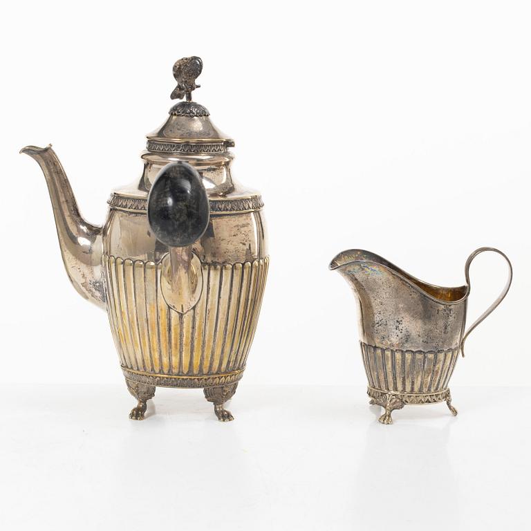 A Swedish silver coffee pot and cream jug, Gustavian style, early 20th century.