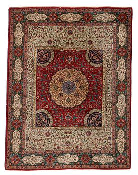 A carpet, semi-antique Tabriz, signed ca 335,5 x 256,5 - 261,5 cm.