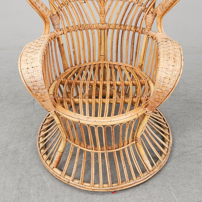GIO PONTI & LIO CARMINATI, A 'Conte Biancamano' rattan Wingback Armchair for Bonacina, Italy.