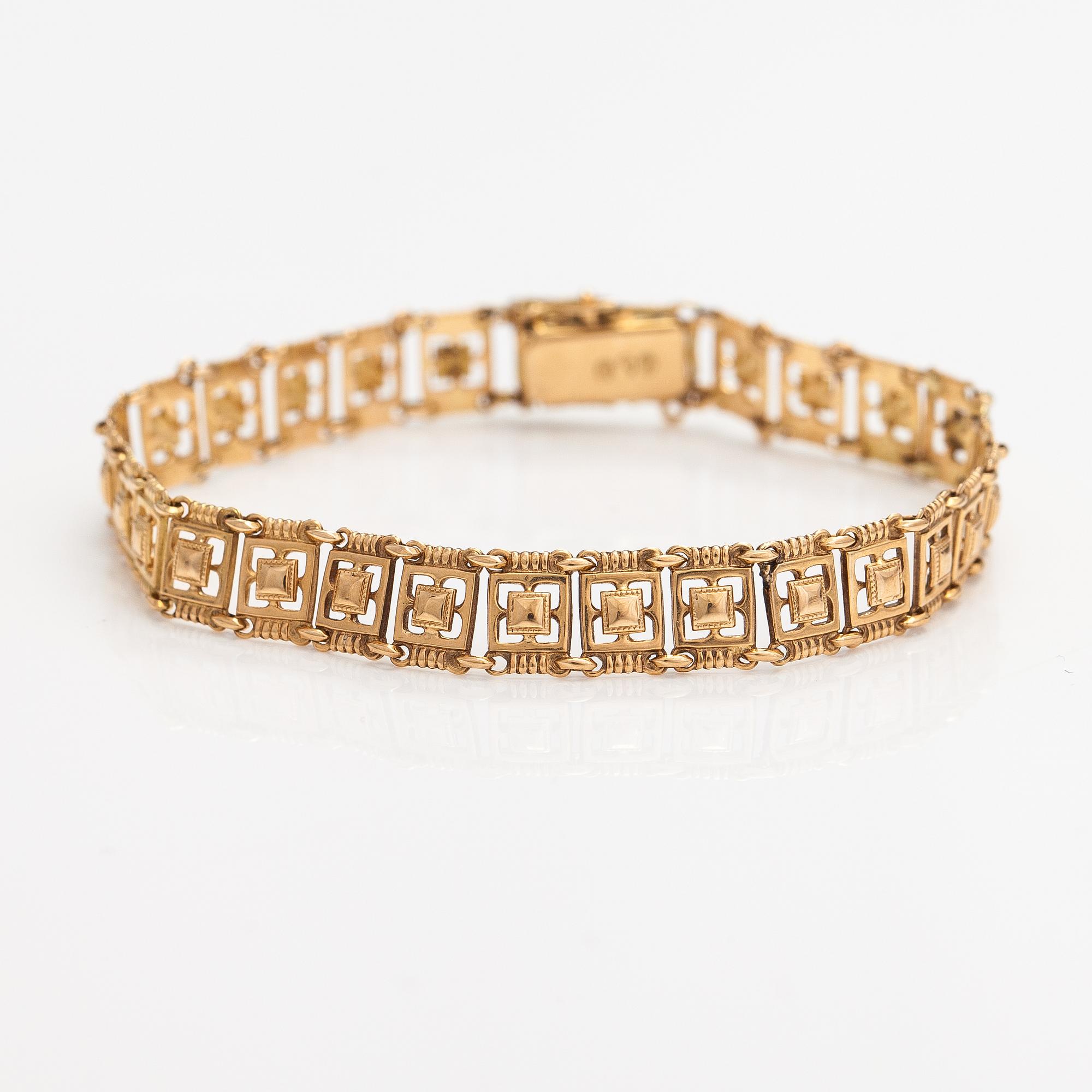 A 14K gold bracelet. Kallion kulta ja kello, Helsinki 1926.