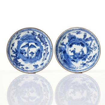 A matched set of eight blue and white cups and stands, Qing dynasty, Kangxi (1662-1722).