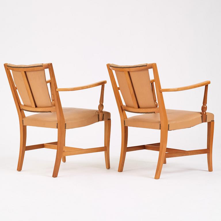 Josef Frank, a pair of mahogany easy chairs, Svenskt Tenn, Sweden 1940-1960s, model 2067.