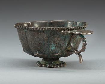 A petal shaped silver cup, presumably Tang dynasty.