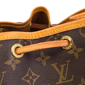 A "Noé" handbag by Louis Vuitton.