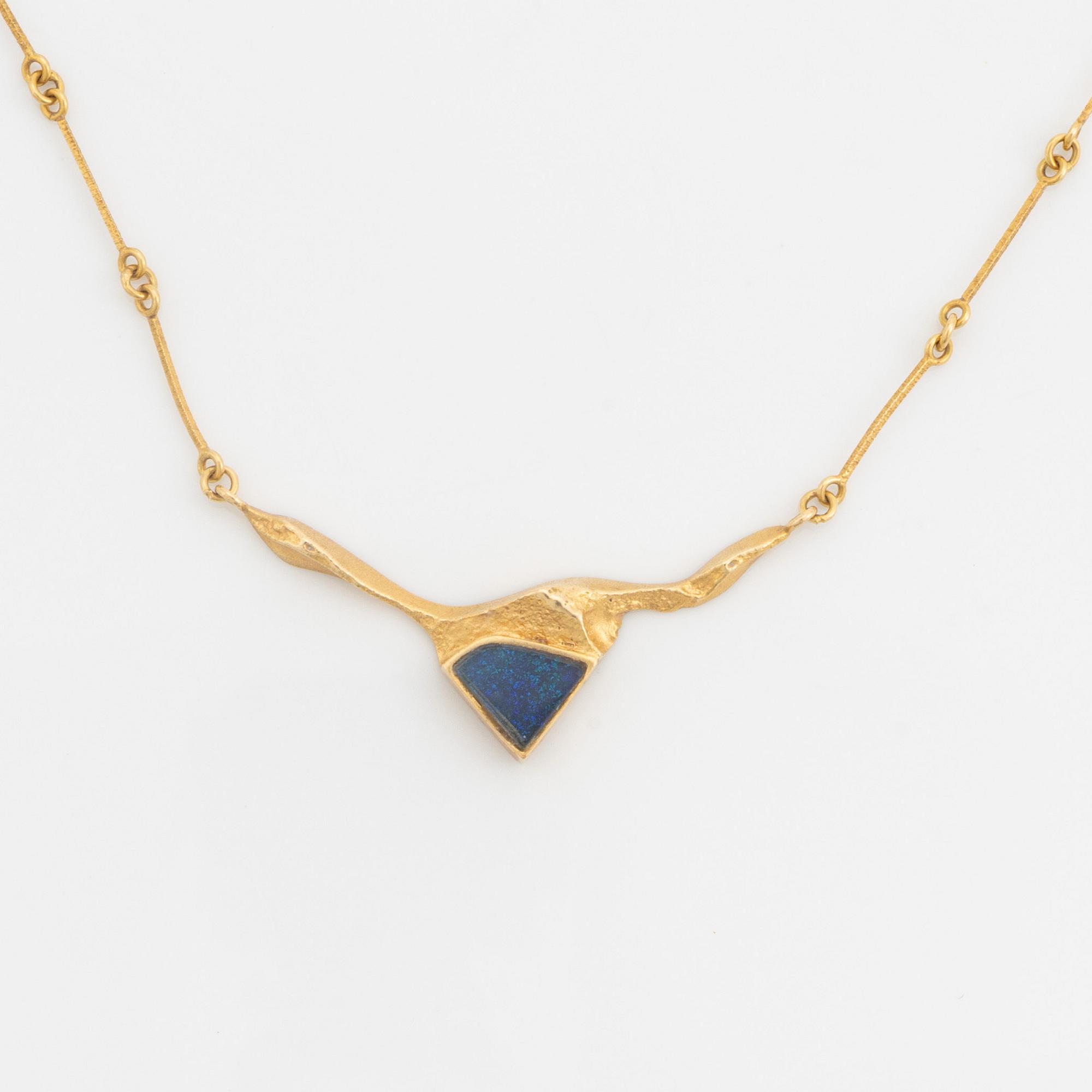 Björn Weckström, An 18K gold Lapponia necklace "Kalypso" with an opal triplette.