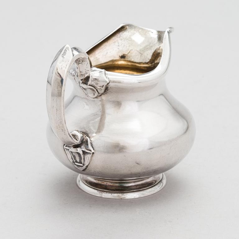 A silver milk jug, maker's mark of Gustav Alexander Sohlman, Saint Petersburg, Russia 1871.