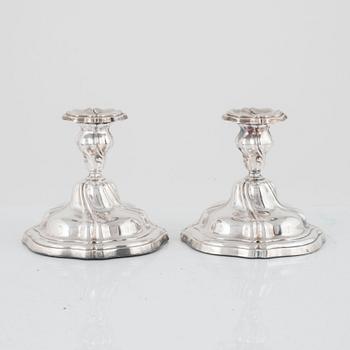 A pair of Norwegian silver candlesticks, mark of Magnus Aase, Bergen, 20th century, Swedish import marks.