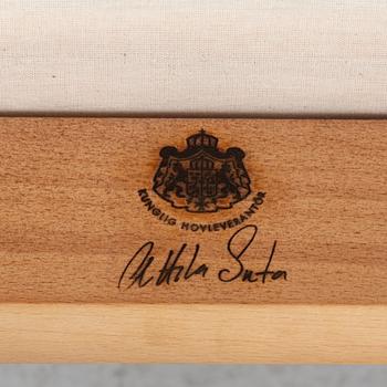 Attila Suta, eight armchairs.