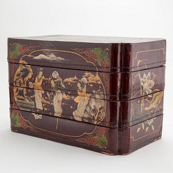 A painted Japanese four tiered box, 20th Century.