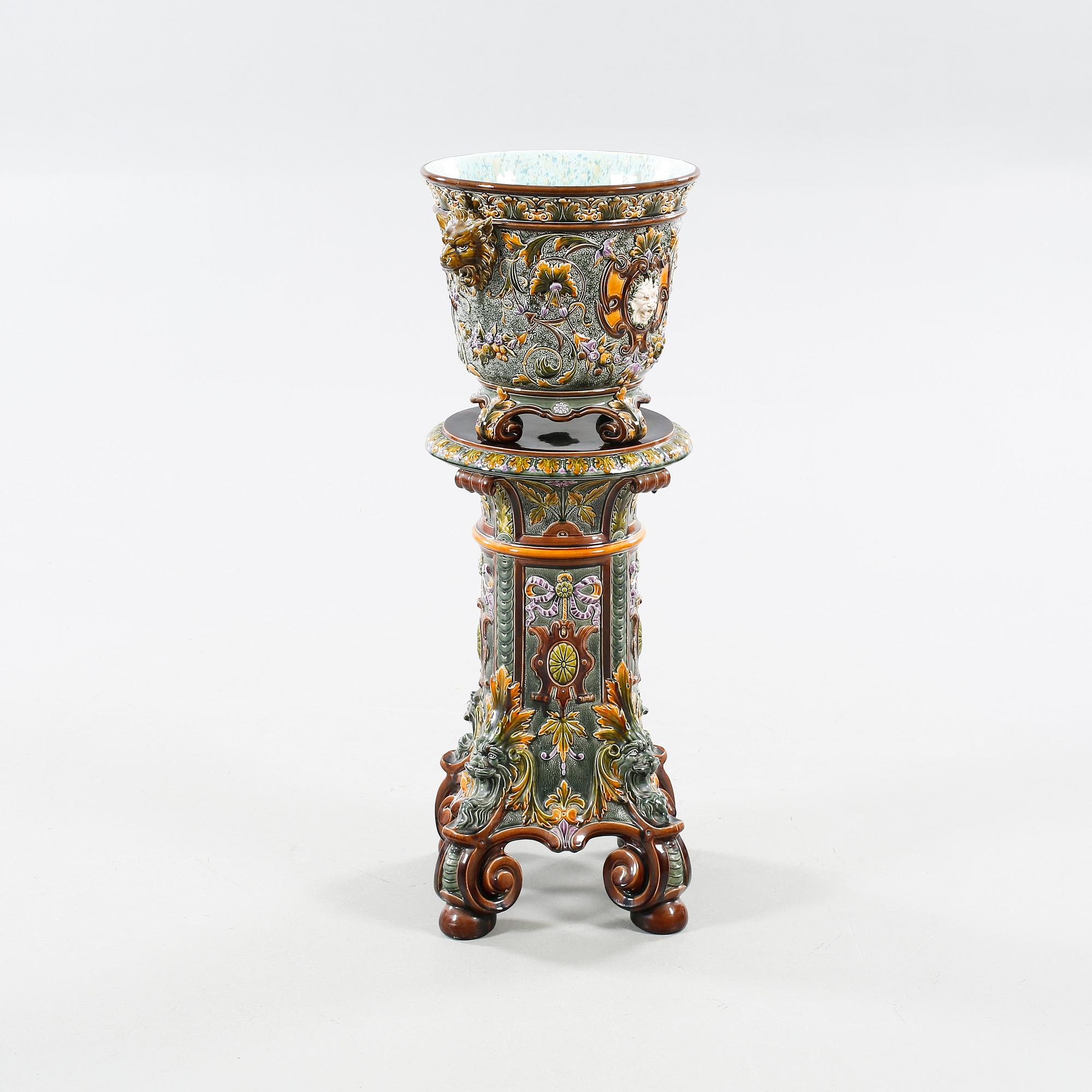 A pot on a pedestal in ceramics made by Rörstrand in the years between 1884-1890.
