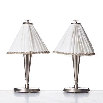 Harald Notini, HARALD ELOF NOTINI, a pair of pewter table lamps by Böhlmarks, Stockholm 1920's-30's.