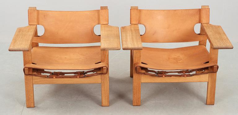 A pair of Børge Mogensen oak and leather 'Spanish chairs', Fredericia stolefabrik, Denmark.