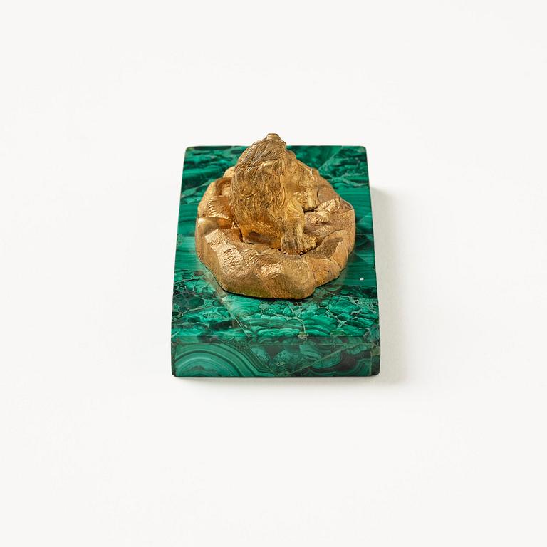 A Russian Nicholas II malachite-veneered and gilt-bronze paperweight, late 19th century.