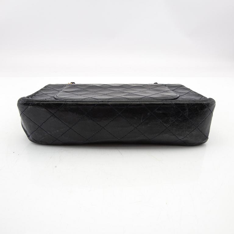 Chanel, a "Double Flap Bag".