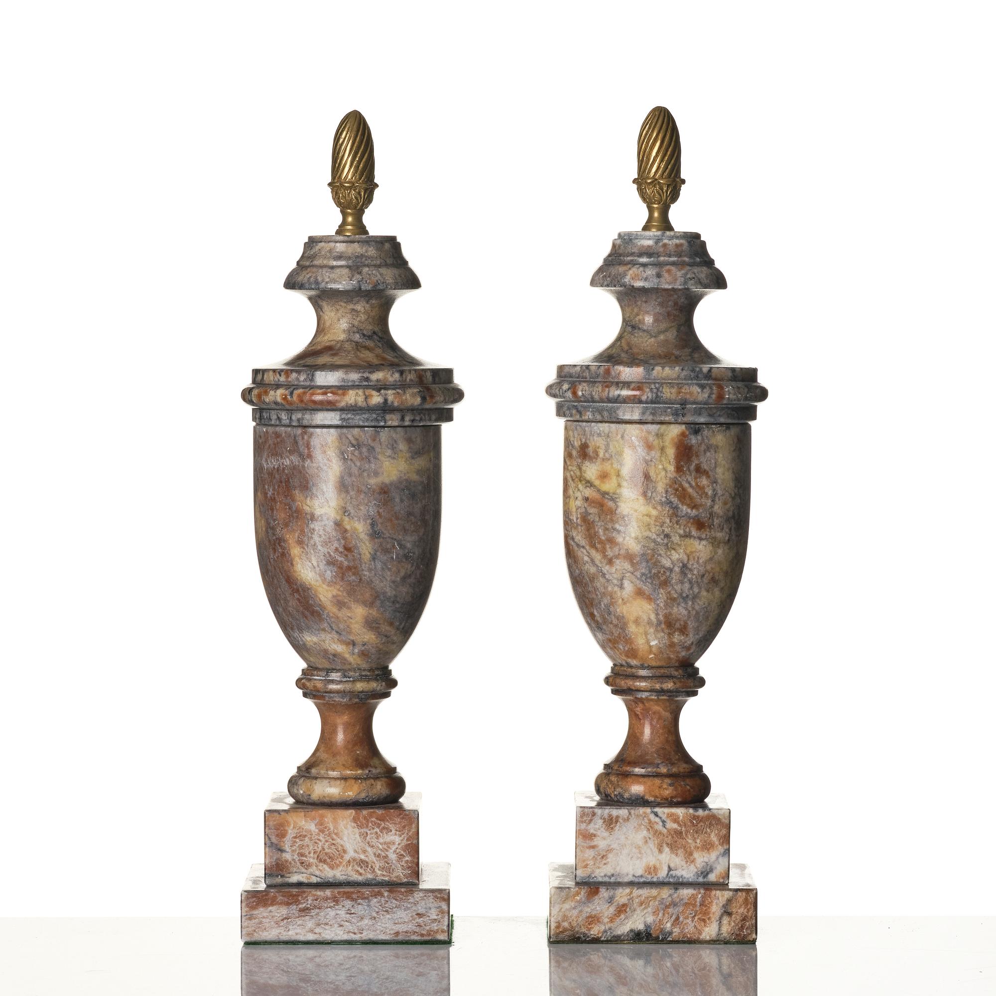 A pair of marble urns, around year 1900.