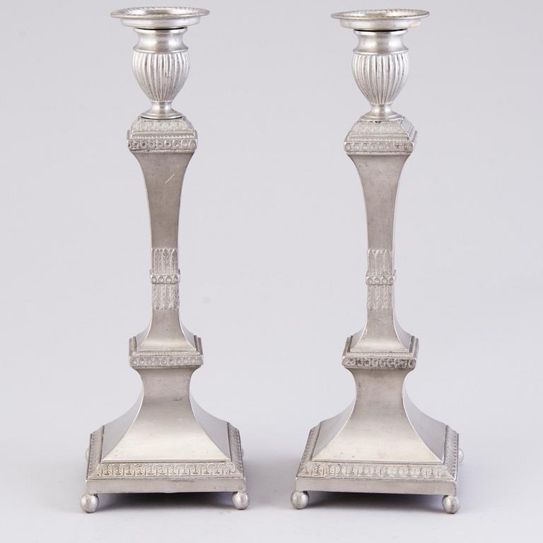 A PAIR OF SWEDISH PEWTER CANDLESTICKS.