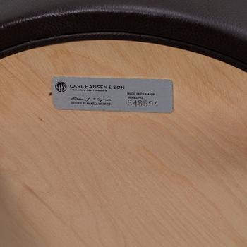 Hans J. Wegner, a pair of bar stools, CH 58, Carl Hansen & Son, Denmark, 21st century.