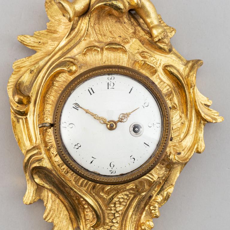 Väggur, rokokostil, late 19th or early 20th century.
