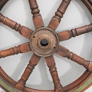 An 19th century ships stering wheel.