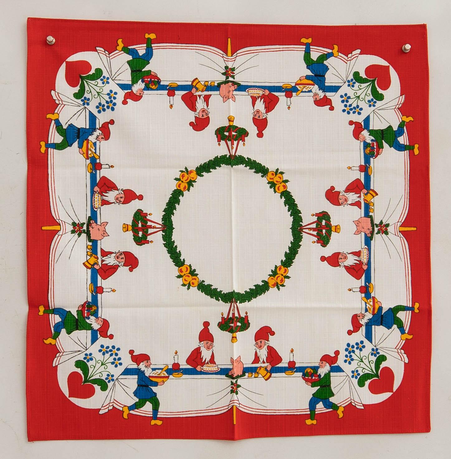 A collection of smaller Christmas tablecloths, runners, and wall hangings, approximately 34 pieces, mid/second half of the 20th century.