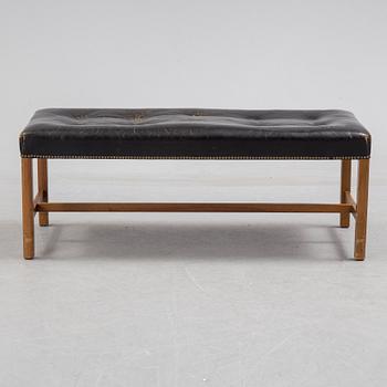 JOSEF FRANK, leather stool/bench, Firma Svenskt Tenn, model 2082.