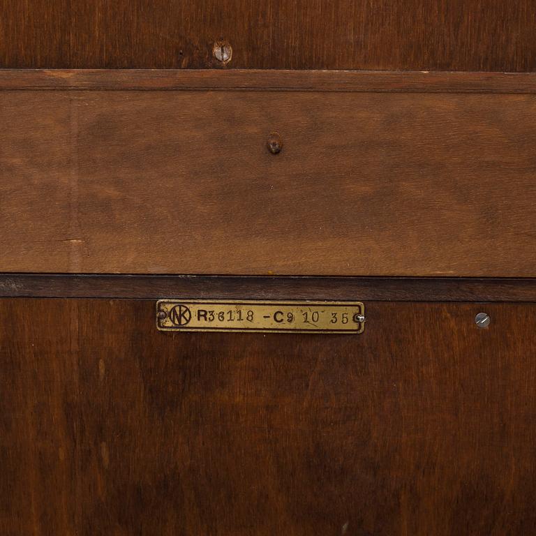 AXEL EINAR HJORTH, a stained birch 'Typenko' bookcase from Nordiska Kompaniet, 1935.