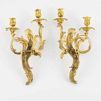 A pair of French Louis XV style two-branch appliques, 19th century.