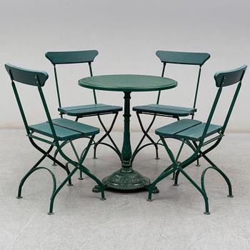 A garden table with four chairs from Byarum Bruk.