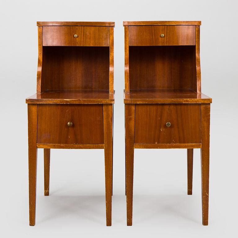 A pair of 20th century bedside tables.