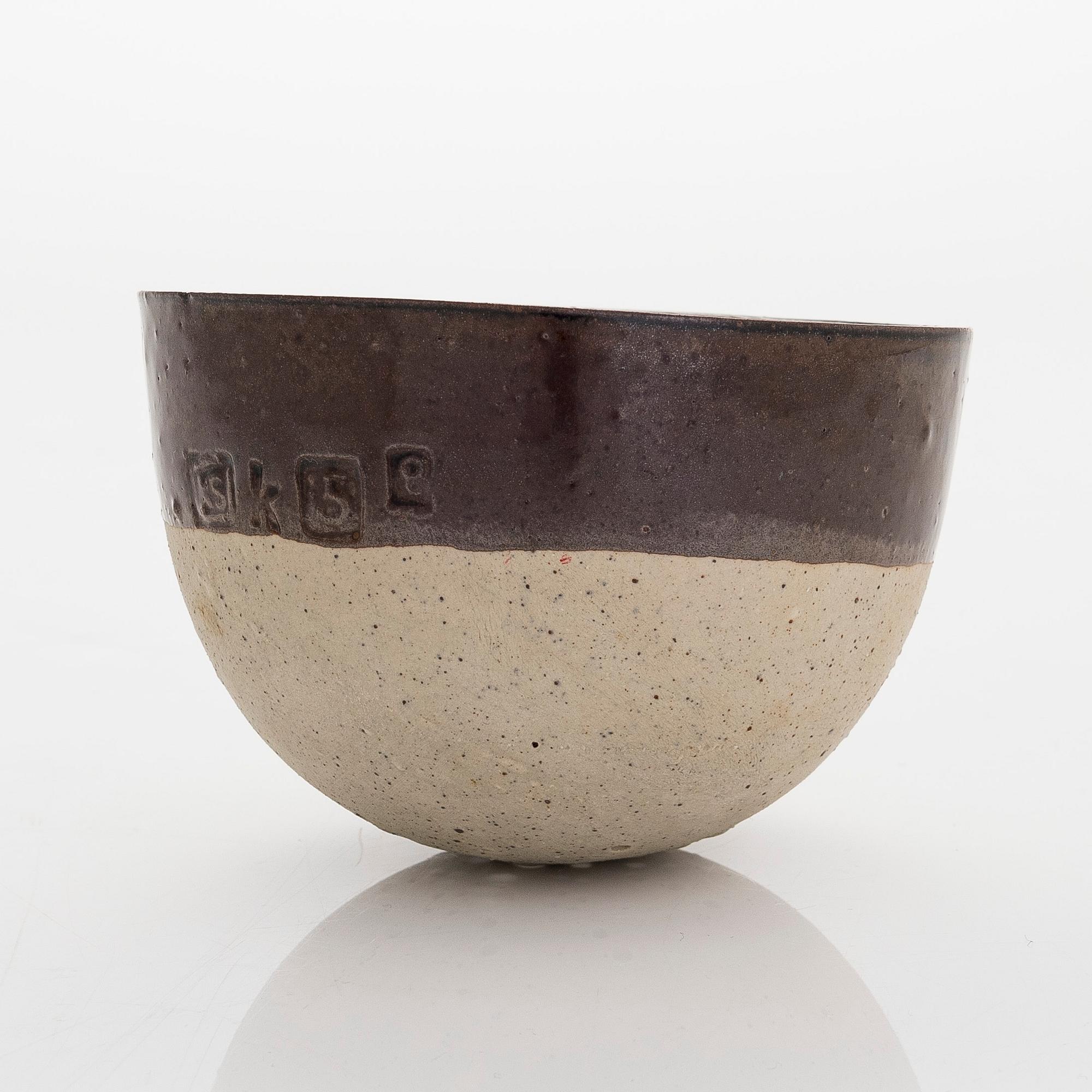 Kyllikki Salmenhaara, a stoneware tea strainer signed KS.