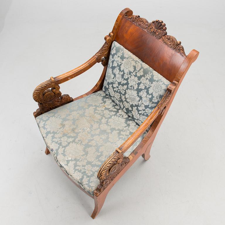 A pair of mid-19th century late Empire Russian open armchair.