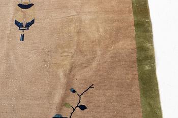 An antique Chinese carpet, c. 293 x 243 cm.