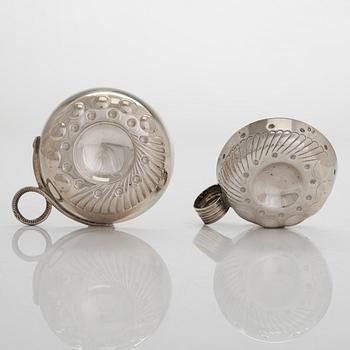 Two French silver taste du vin cups, 1819-38 and early 20th century.