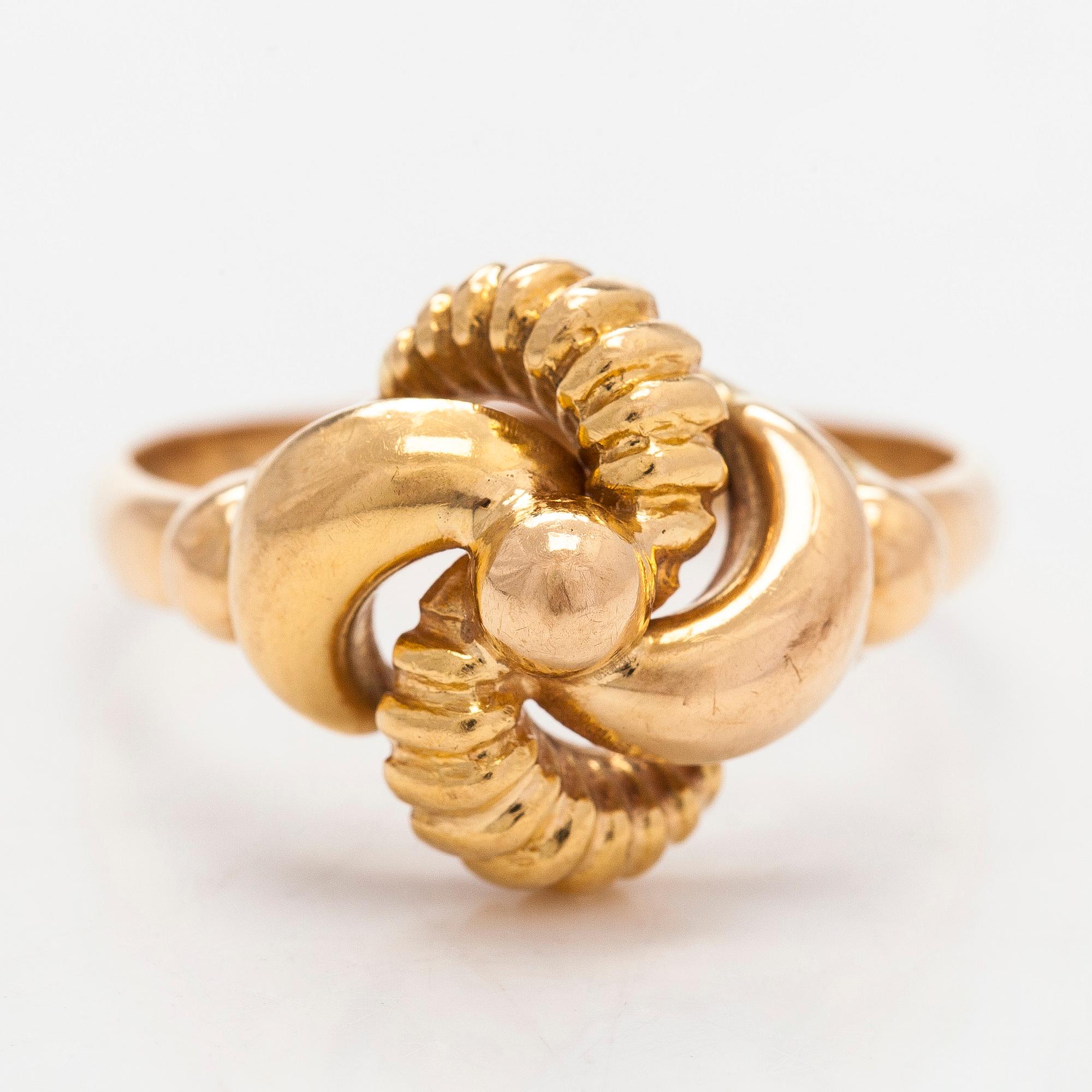 A 14K gold ring.