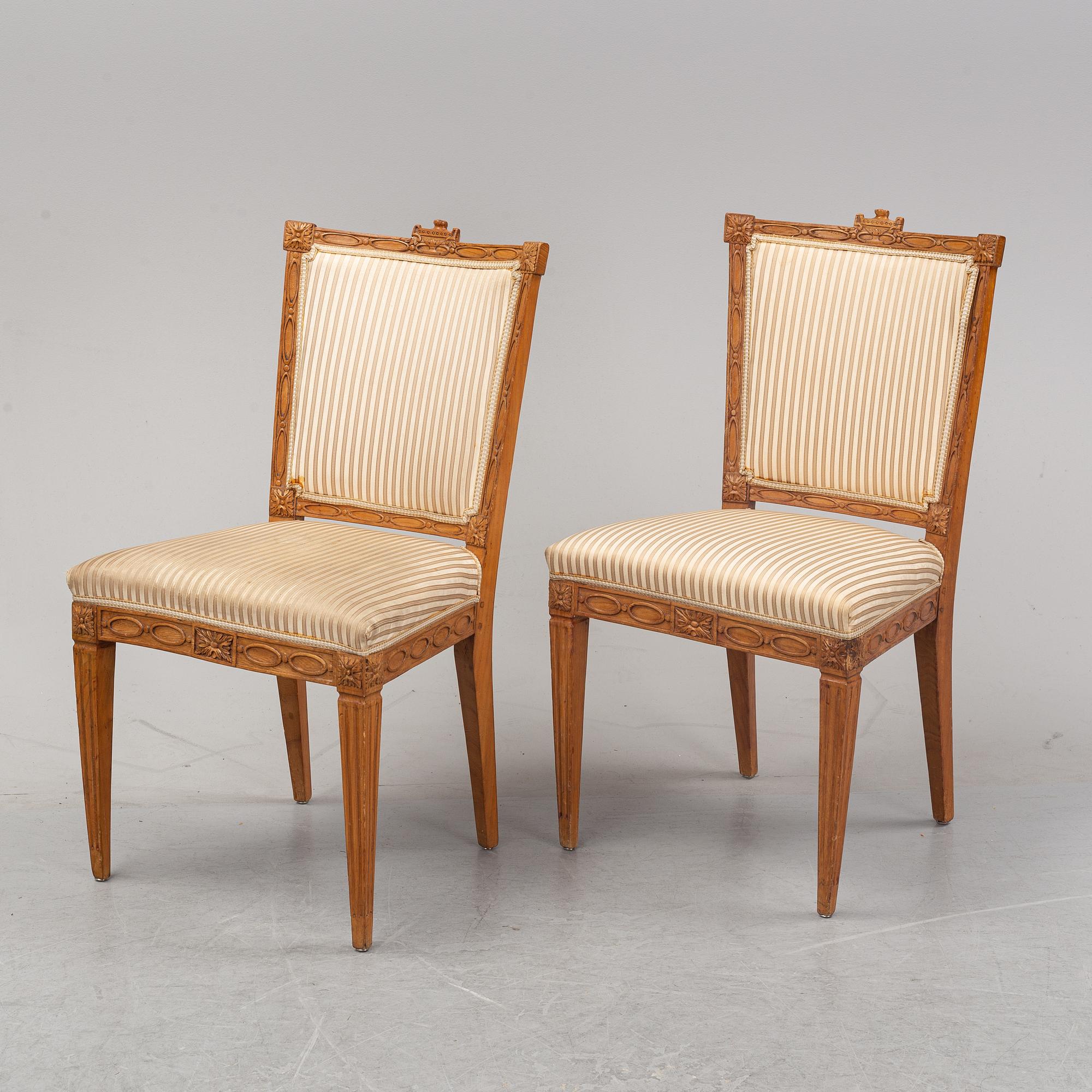Six Louis XVI style oak chairs from around the year 1900.