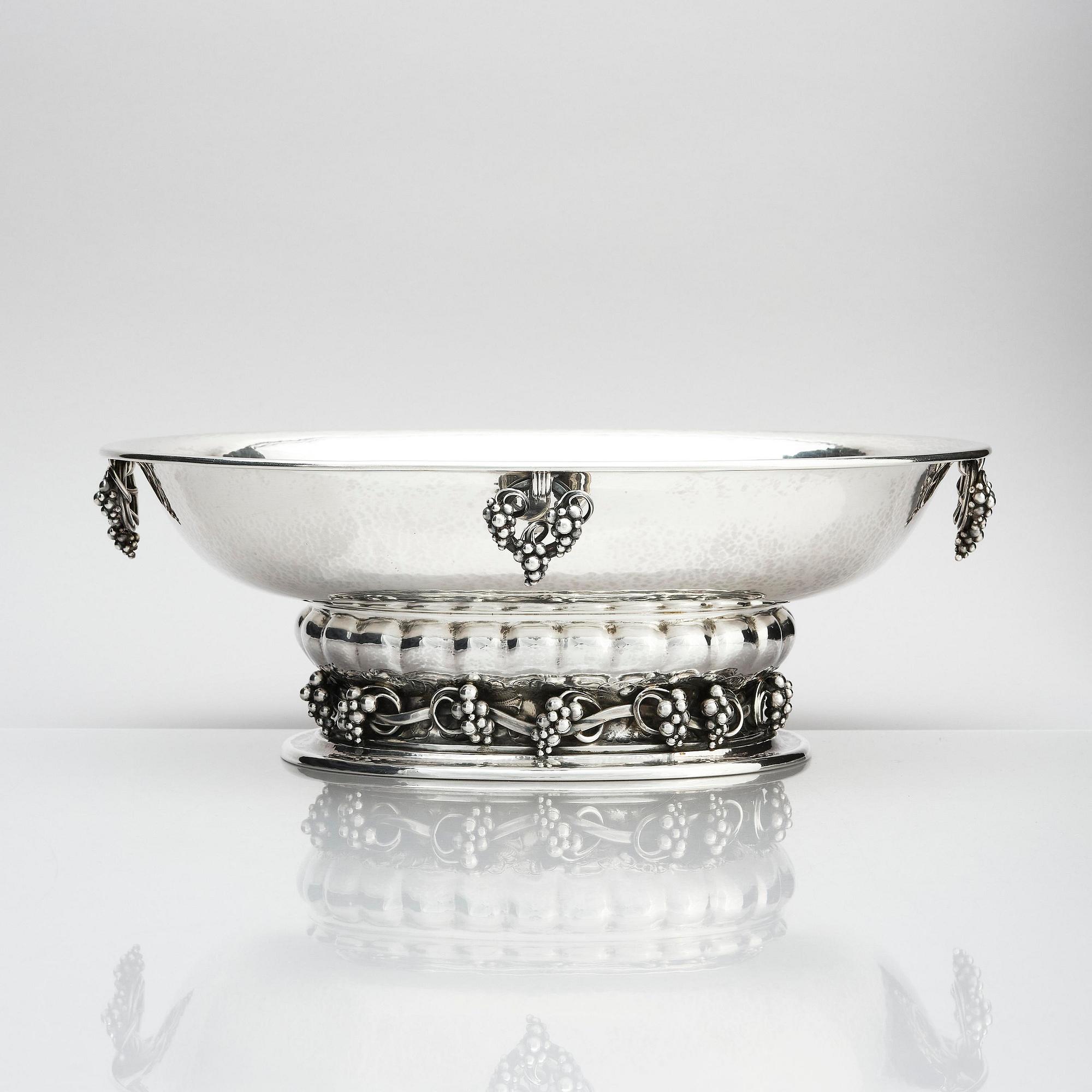 Georg Jensen, an 830/1000 silver centerpiece with grapes, Copenhagen 1925-32, design nr 296A from 1919.