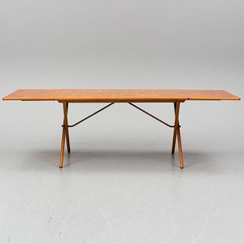 HANS J WEGNER, a teak and oak drop-leaf dining table, Andreas Tuck, Denmark 1950'-60's.