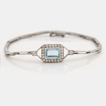 A step-cut aquamarine, old and single cut diamond bracelet.