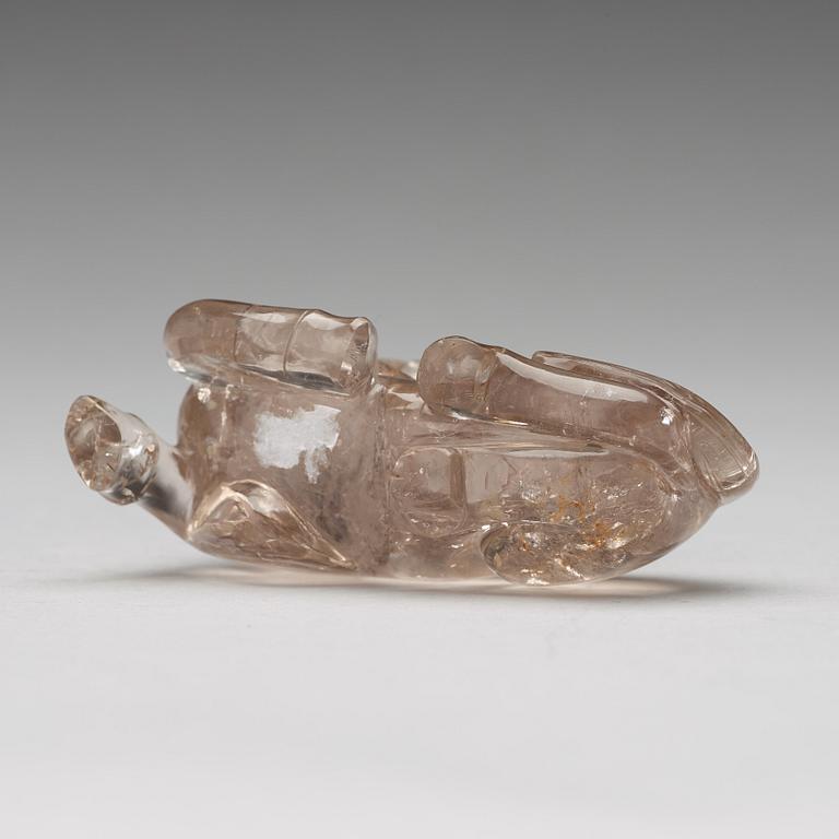 A quartz carving of a reclining horse, China.