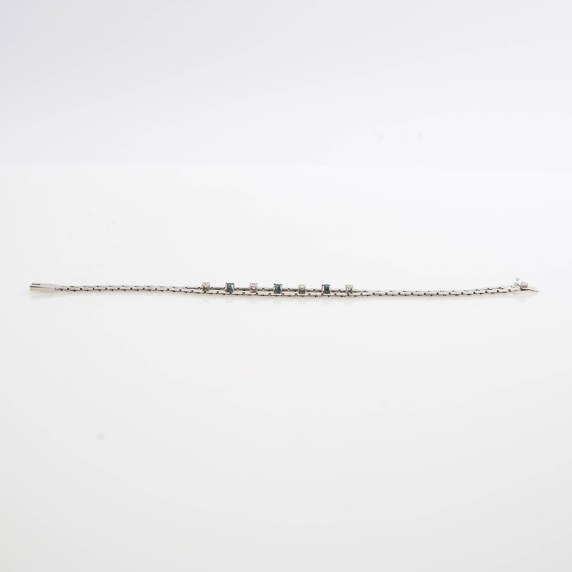 Armband, 14K guld med diamanter och safirer.