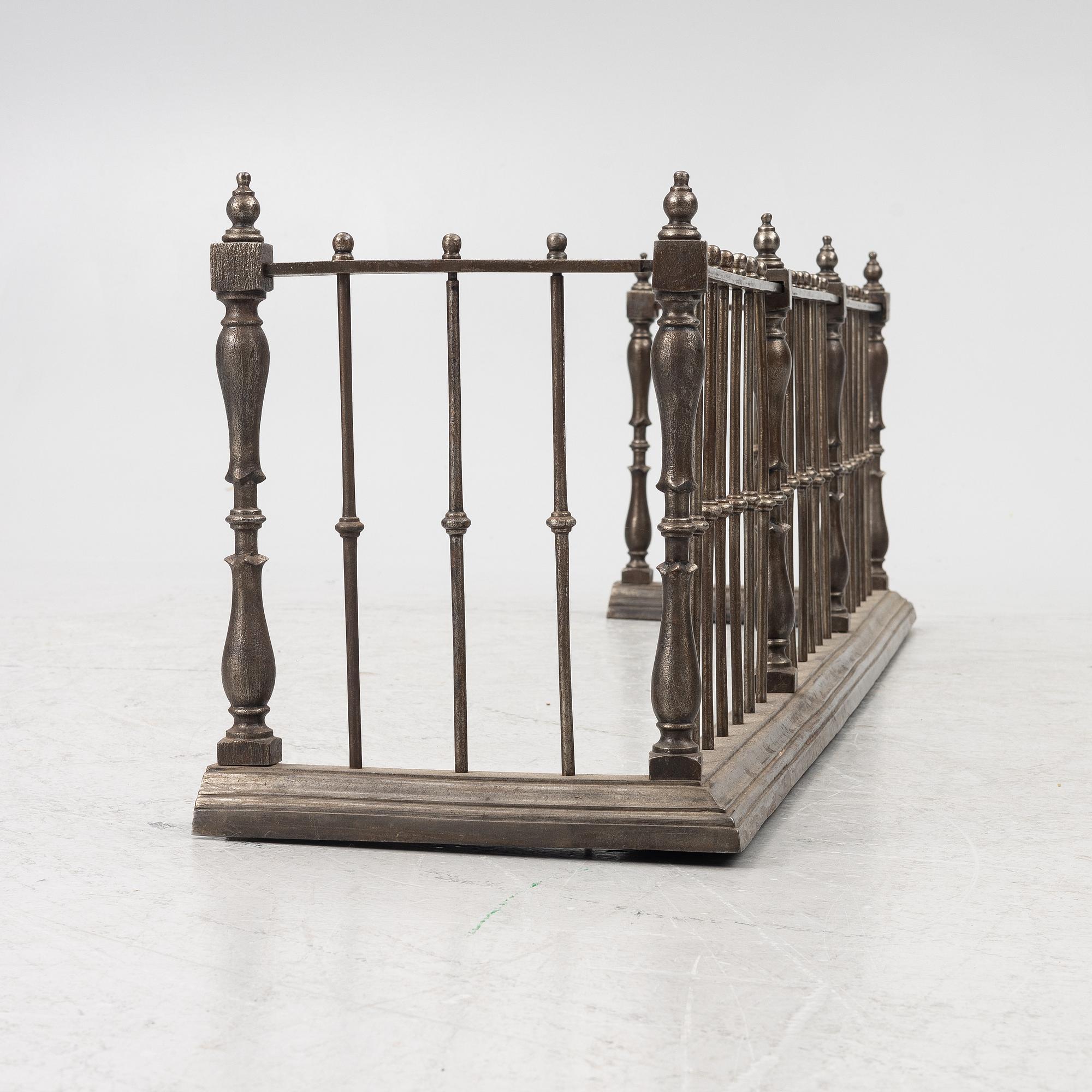 An English brass fire gate, circa 1800.