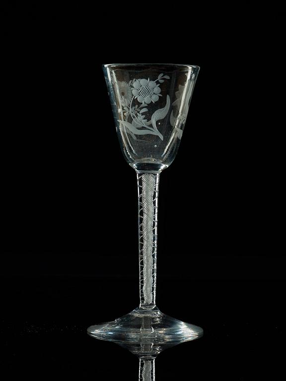 A set of four engraved lattichino glasses, England, 18th Century.