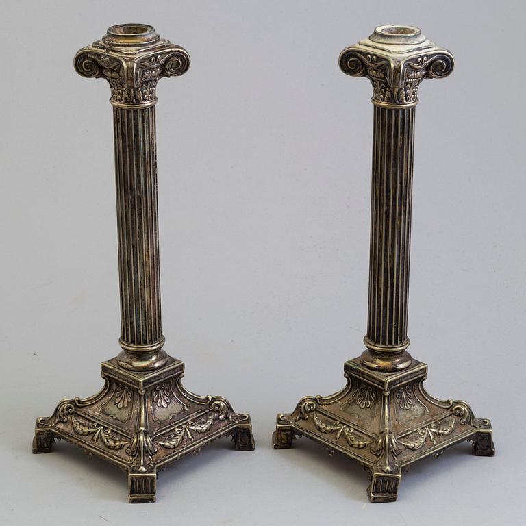 A pair of plated candel sticks from the fist half of the 20th century.