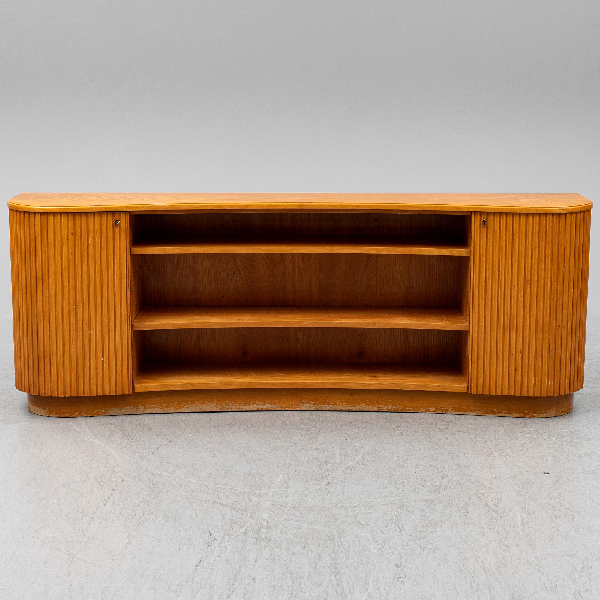 A 1940s elm veneered shelf.