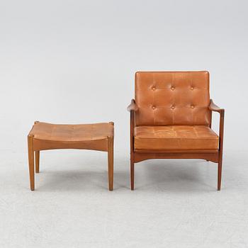 A 1960's 'Kandidaten' easy chair by Ib Kofod Larsen for OPE with additional, not original, stool.