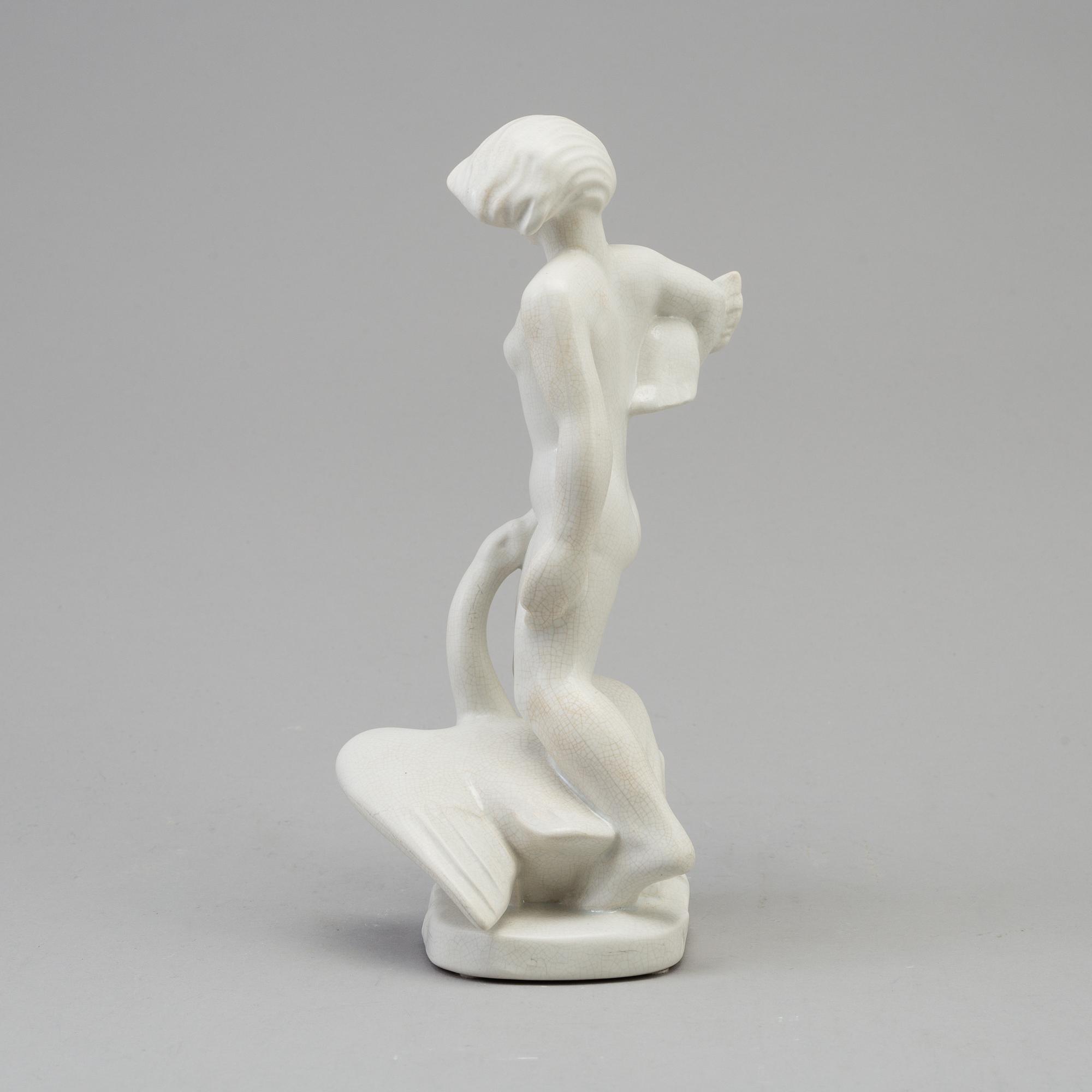 A Nils E. Hansson creamware figure figure, Gefle, Sweden 1936-52.