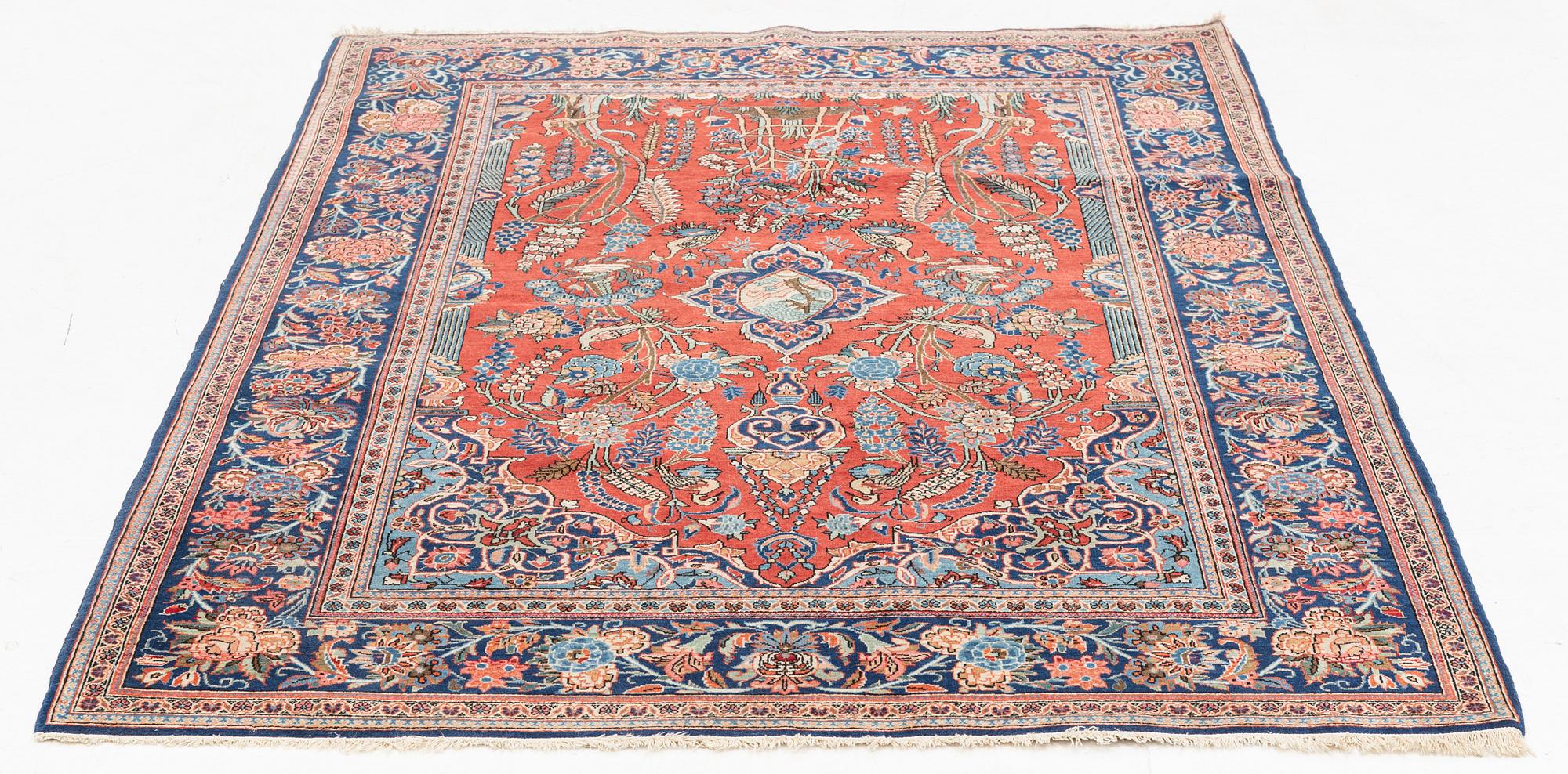 A semi-antique Kashan rug, approximately 200 x 134 cm.