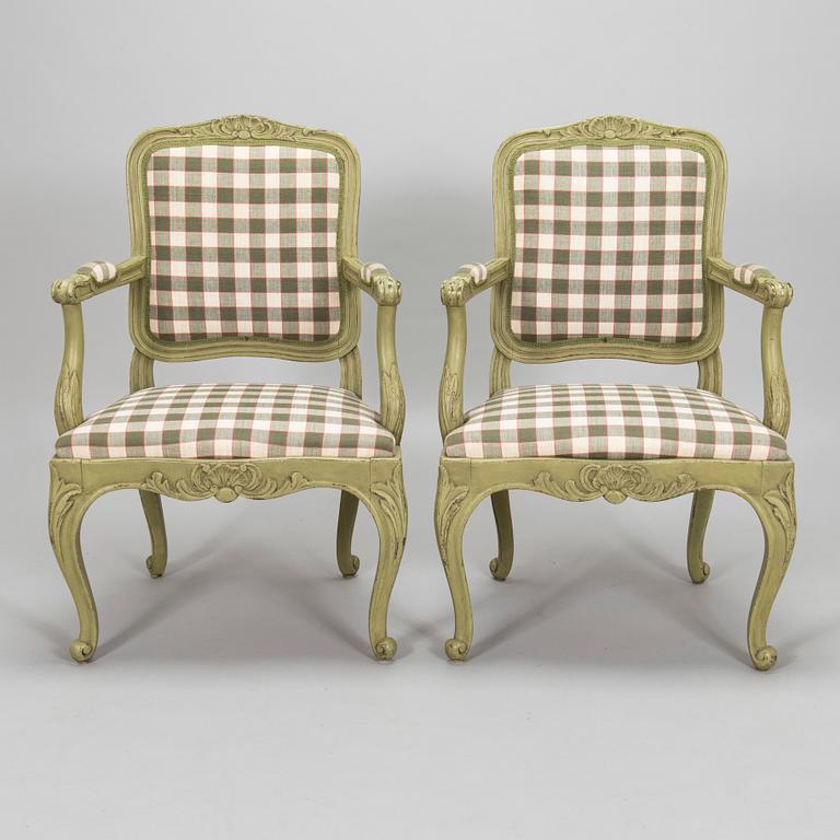 A pair of 20th century  Rococo style armchairs.