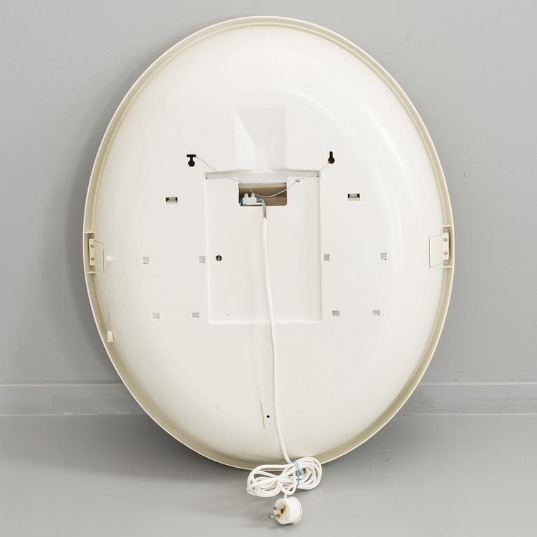A "SPACE AGE" WALL MIRROR WITH LIGHT BY ALLIBERT, 1970´s.