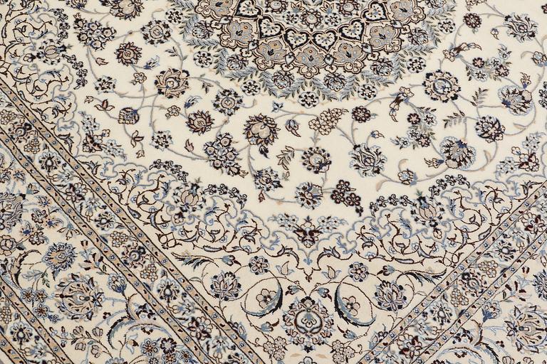 A Nain part silk carpet, 210 x 200 cm.